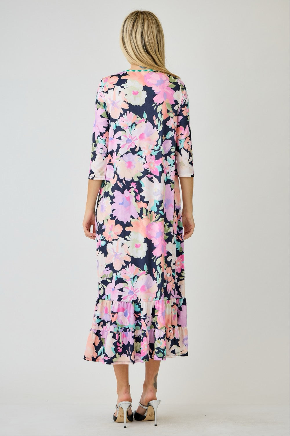 Navy watercolor floral tiered ruffle dress with pockets from Celeste Clothing, perfect for summer, displayed on a mannequin.