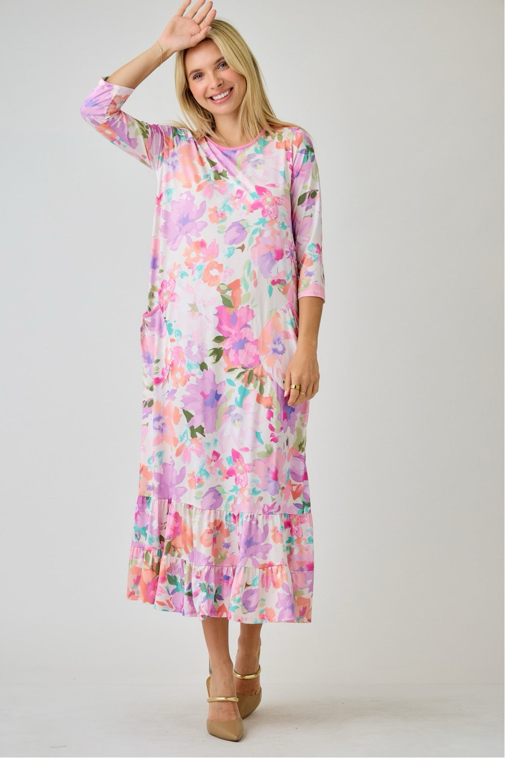 Navy watercolor floral tiered ruffle dress by Celeste Clothing with pockets, featuring a summer floral design and lightweight fabric.