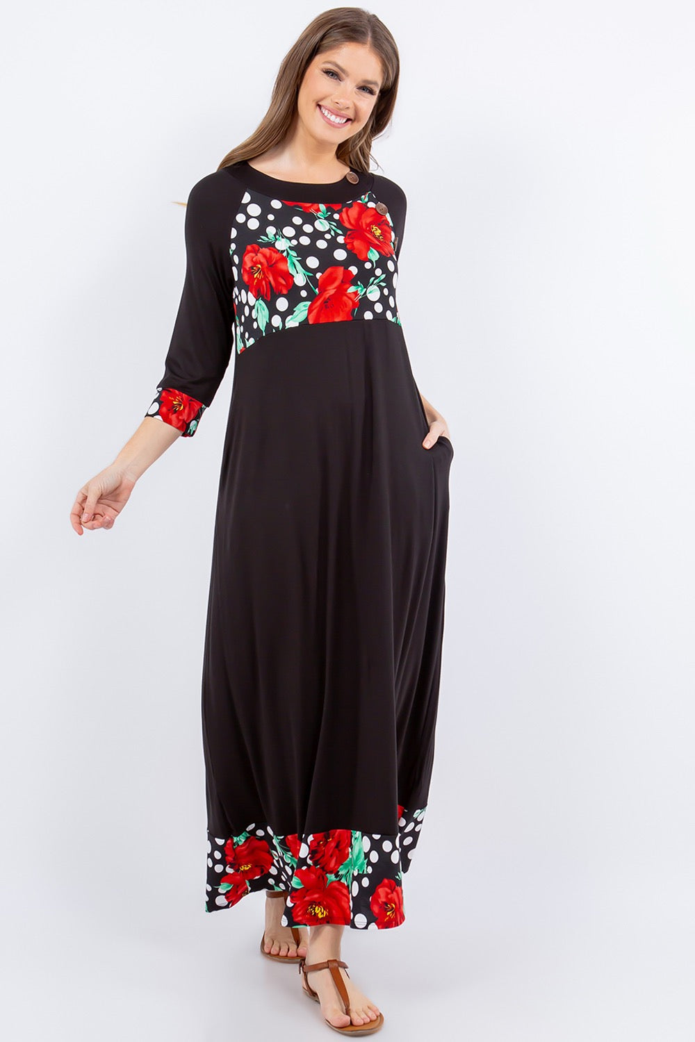Black and red 3/4 sleeve maxi dress with floral and polka dot accents by Celeste Clothing, featuring a flowing, elegant design.
