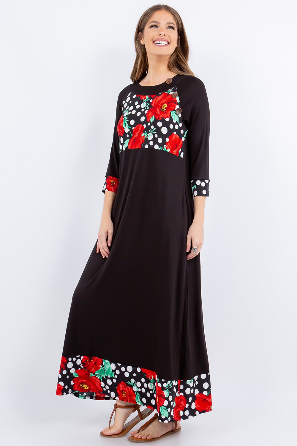 Black and red 3/4 sleeve maxi dress with floral and polka dot accents by Celeste Clothing, featuring a flowing silhouette.