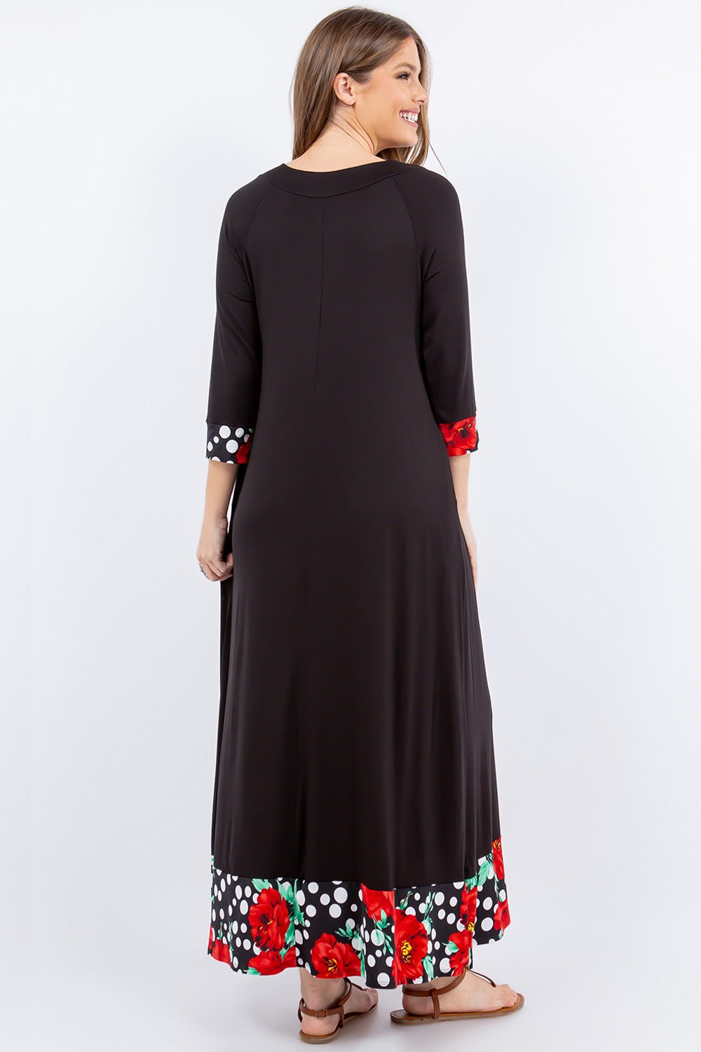Black and red 3/4 sleeve maxi dress with floral and polka dot accents by Celeste Clothing, featuring a flowing silhouette.