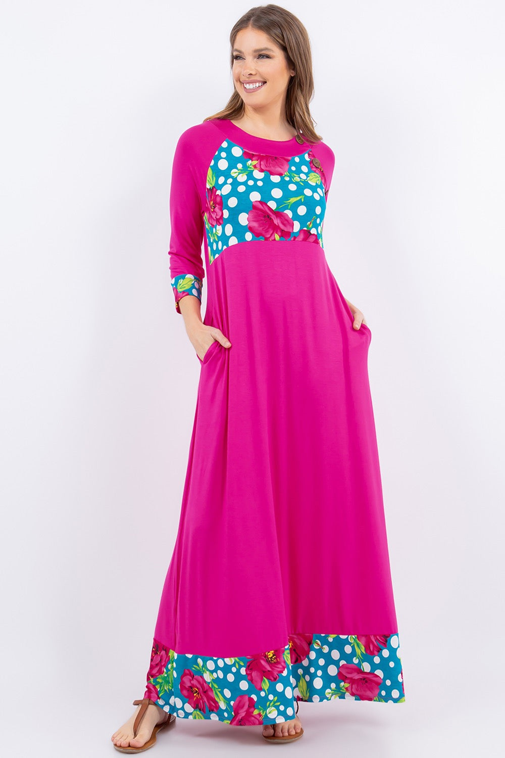 Fuchsia 3/4 sleeve maxi dress by Celeste Clothing with floral and polka dot accents, flowing and stylish for casual or dressy occasions.