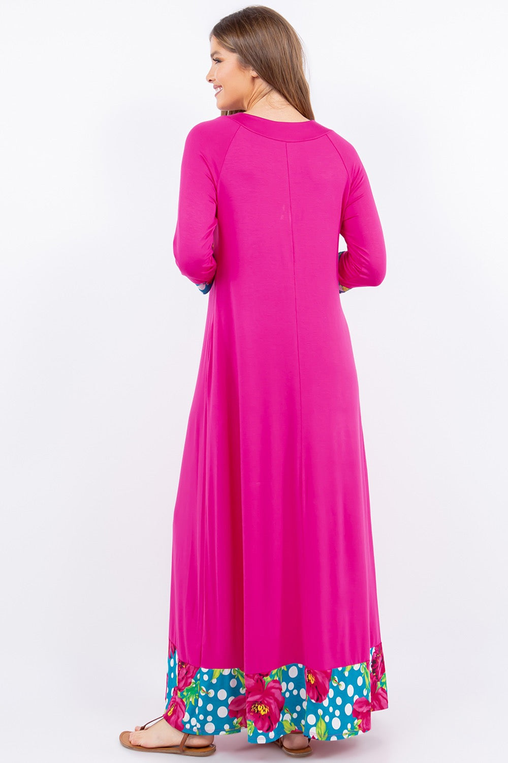 Celeste Clothing fuchsia 3/4 sleeve maxi dress with floral and polka dot accents, flowing and stylish for casual or formal wear.