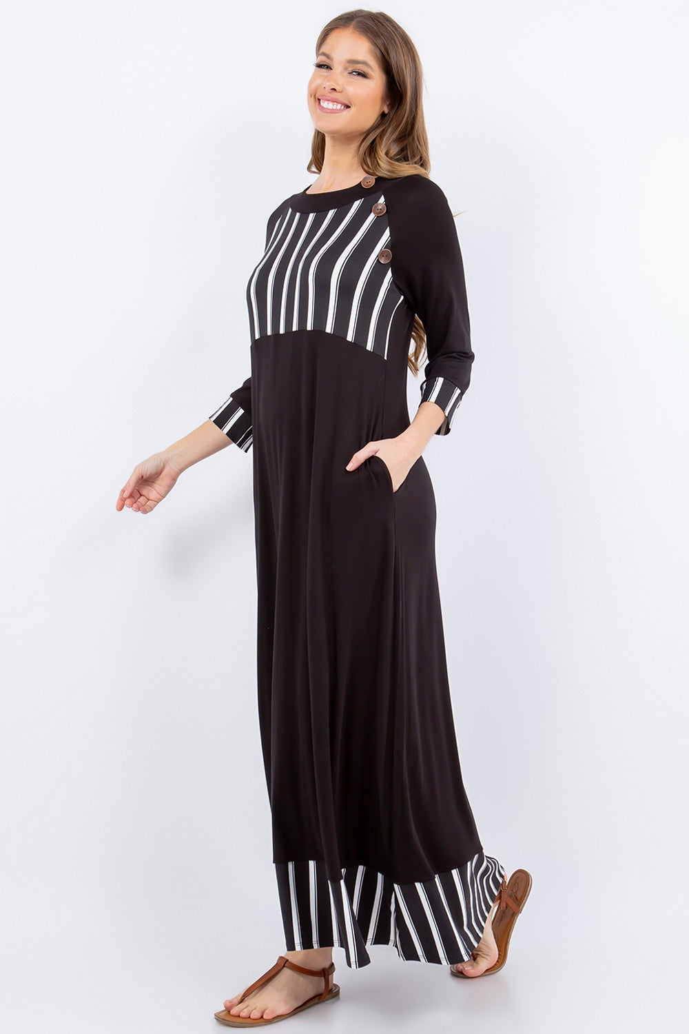 Black and white striped 3/4 sleeve maxi dress by Celeste Clothing, featuring a stylish stripe accent and flowing silhouette.