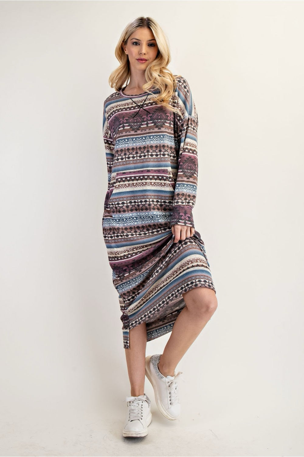 Celeste Clothing Aztec print sweatshirt dress in maxi length, featuring southwestern patterns, available in missy and plus sizes.