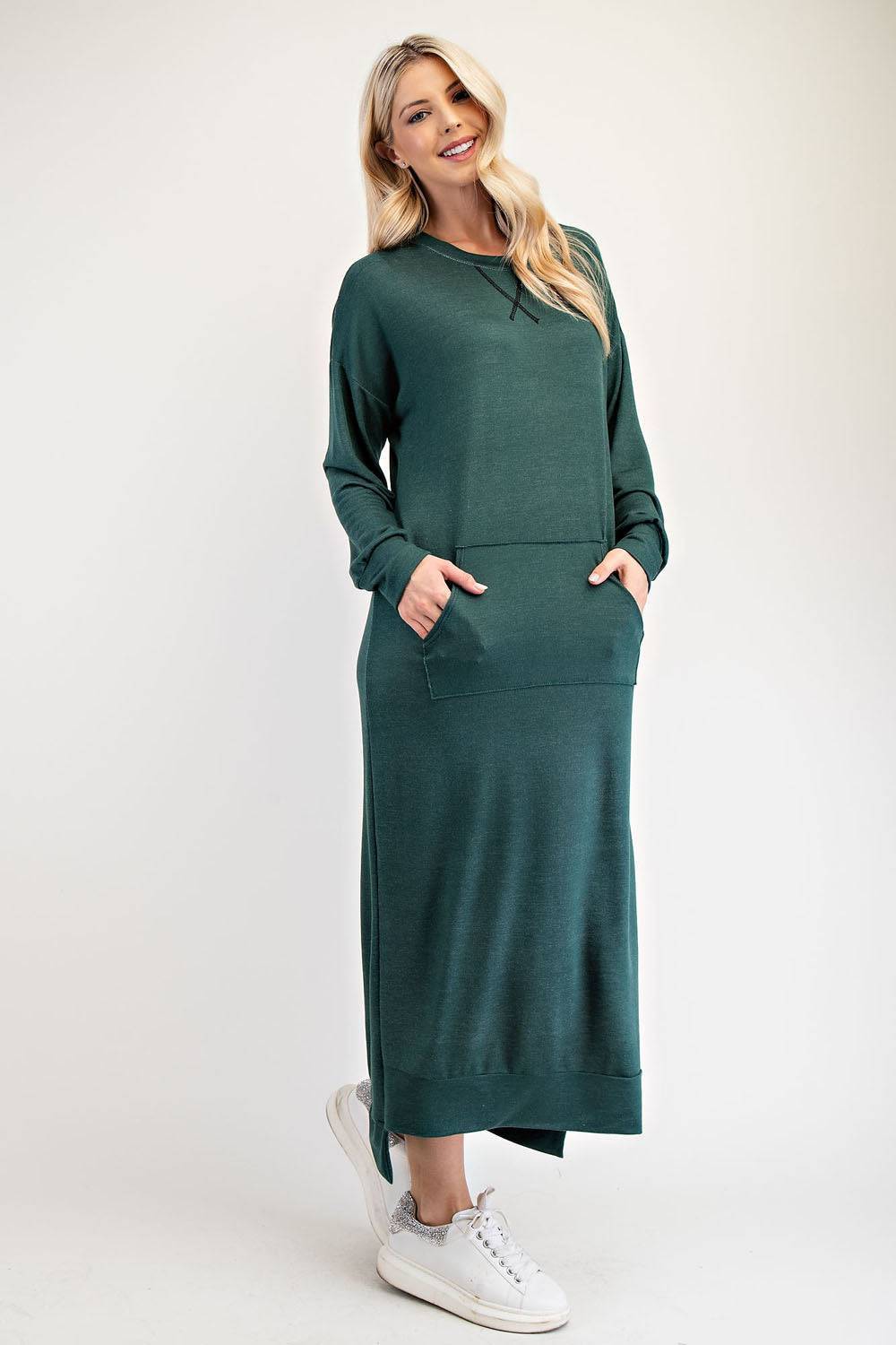 Black sweatshirt-style maxi dress from Celeste Clothing, available in Missy and Plus sizes, shown on a model.