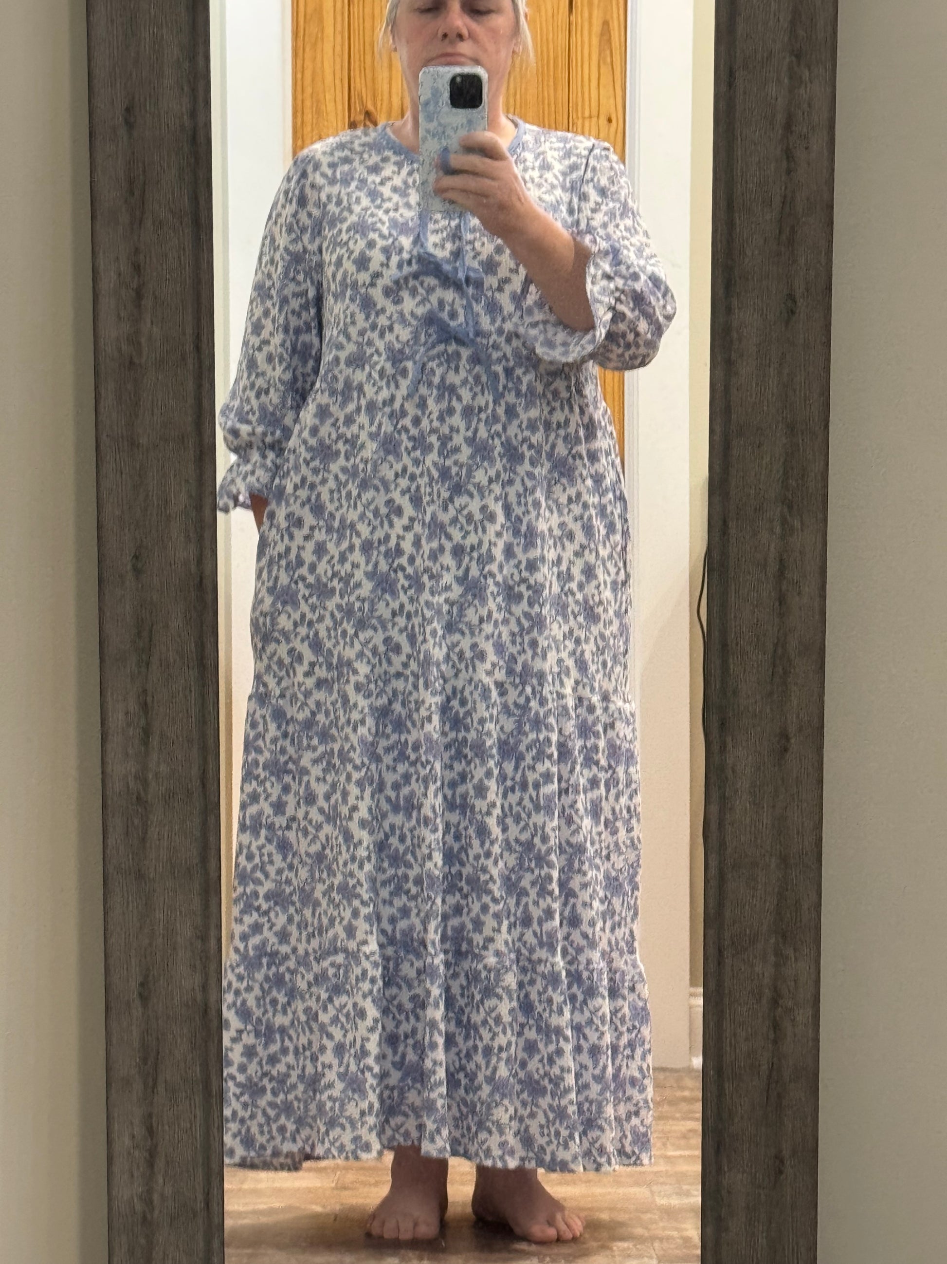 French Blue Floral Maxi Dress by Celeste Clothing featuring gauze-like fabric and a bow accent, perfect for elegant summer wear.