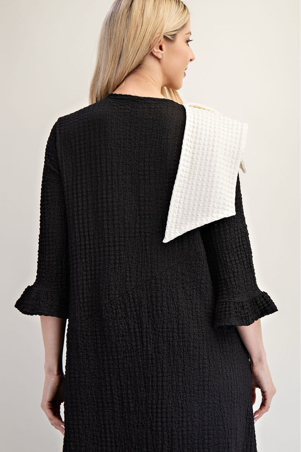 Celeste Clothing Glam Big Bow Dress showing a stylish dress with a large bow detail, perfect for elegant occasions.