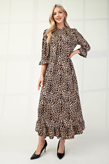 Plus size leopard print dress by Celeste Clothing with 3/4 sleeves and ruffle trim, stylish and comfortable for everyday wear.