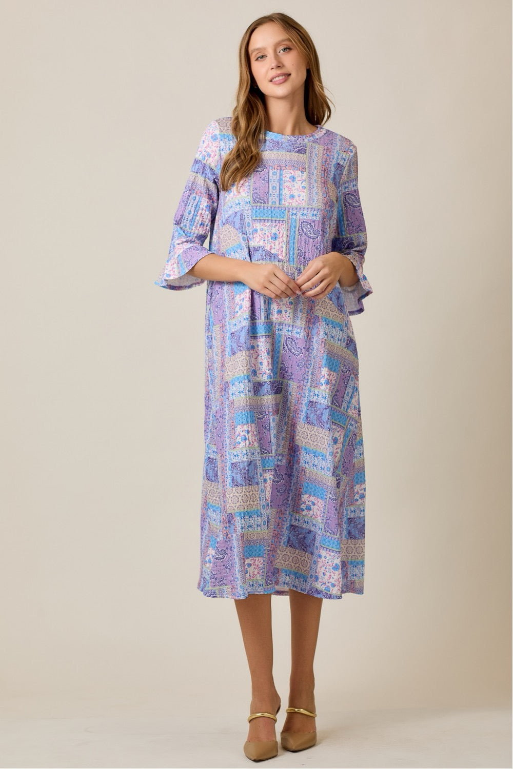 Lilac Modest A-Line Patchwork Print Dress by Celeste Clothing, featuring a flowing silhouette and colorful patchwork pattern.