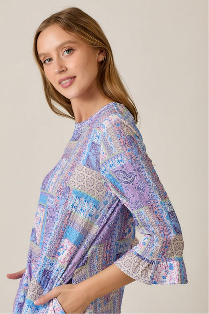 Lilac Modest A-Line Patchwork Print Dress by Celeste Clothing, featuring a flowing silhouette and colorful patchwork design.
