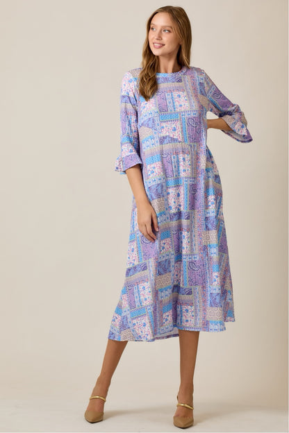 Lilac Modest A-Line Patchwork Print Dress by Celeste Clothing, featuring a flowy silhouette and colorful patchwork design.