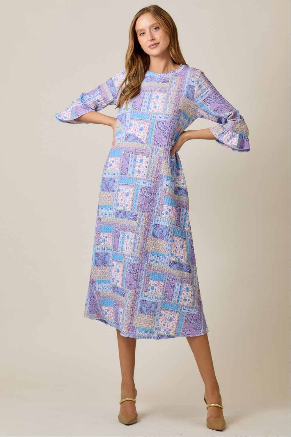 Lilac Modest A-Line Patchwork Print Dress by Celeste Clothing, featuring a flowing silhouette and colorful patchwork pattern.