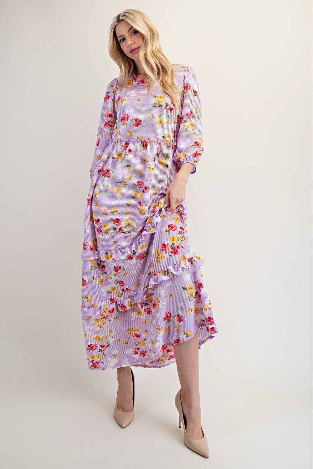 Lilac modest floral tiered maxi dress from Celeste Clothing, flowing dress with long sleeves and layered design.