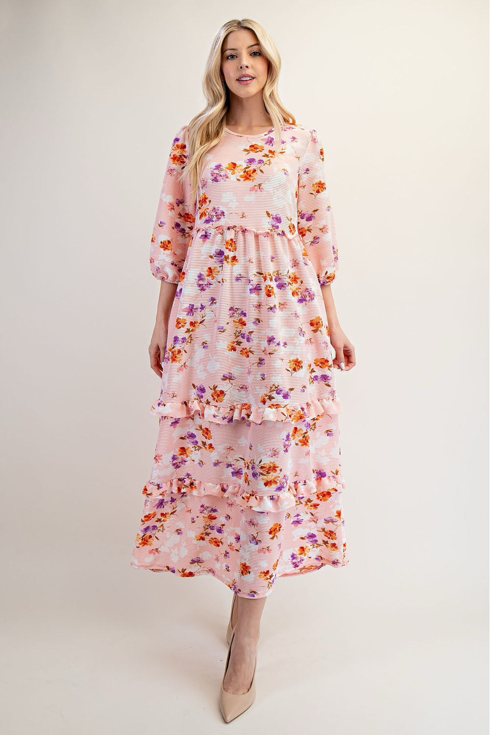 Peach modest floral tiered maxi dress from Celeste Clothing, featuring a flowy silhouette and elevated floral print.