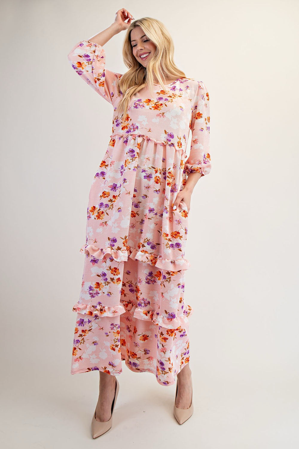 Celeste Clothing peach floral tiered maxi dress featuring modest design and flowing fabric, perfect for elegant everyday wear.