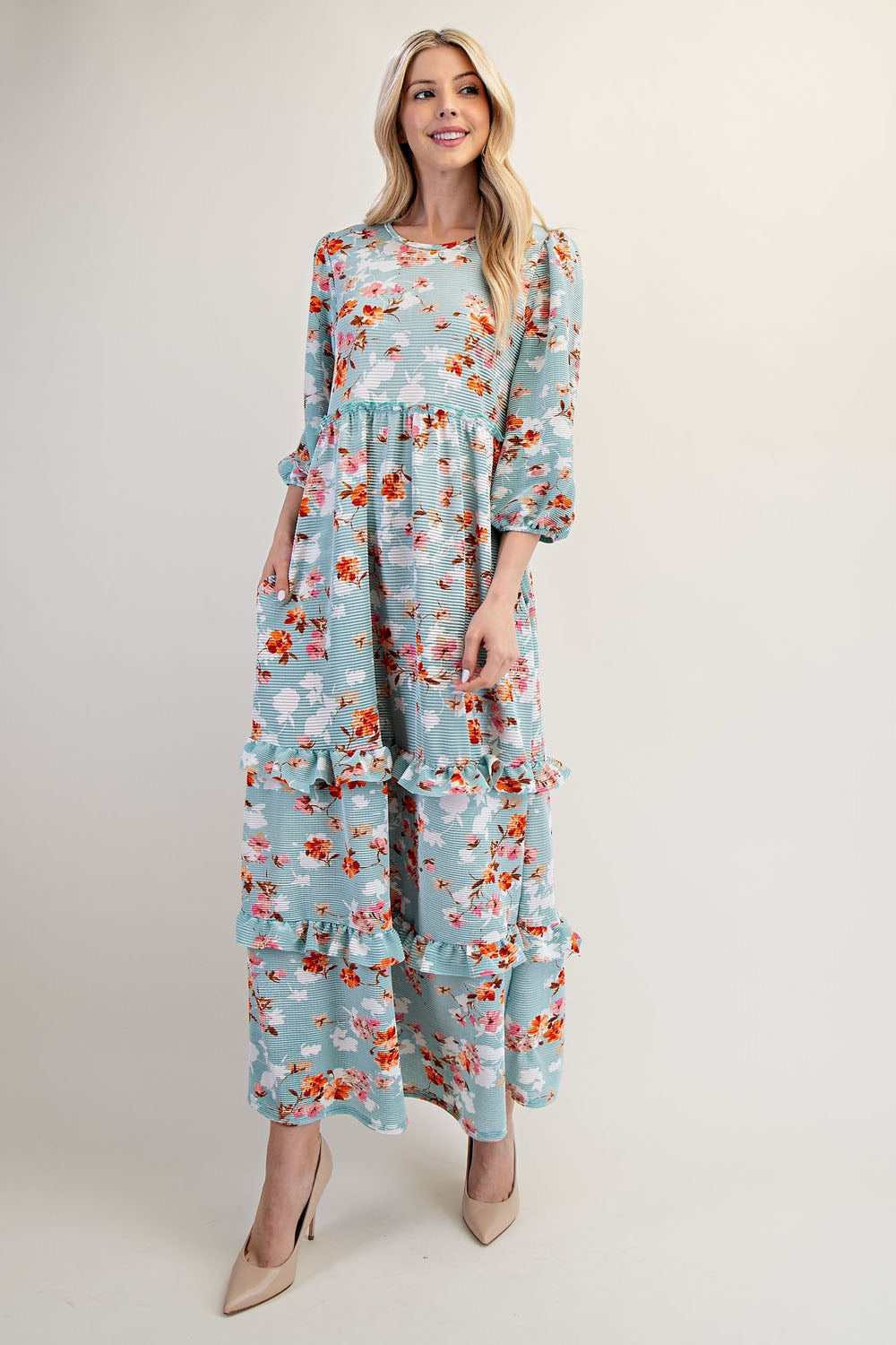 Modest floral tiered maxi dress from Celeste Clothing in sage light teal, featuring a flowing, layered design and long sleeves.