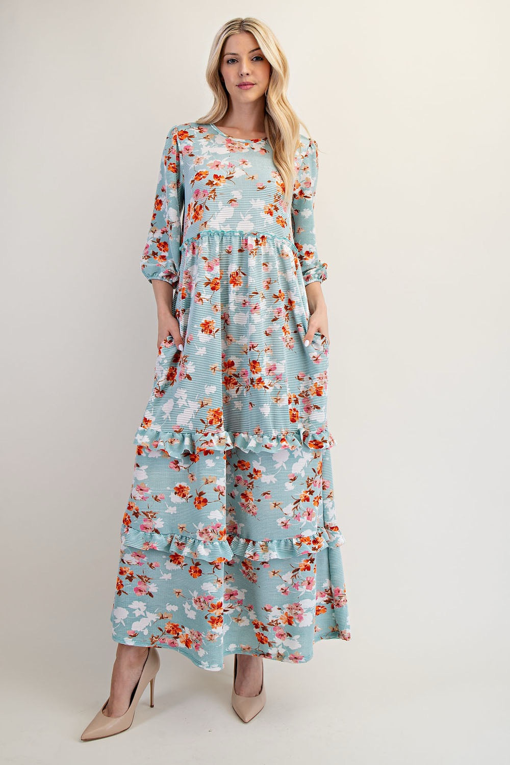 Modest floral tiered maxi dress from Celeste Clothing in sage light teal, featuring a flowy, layered design and floral print.