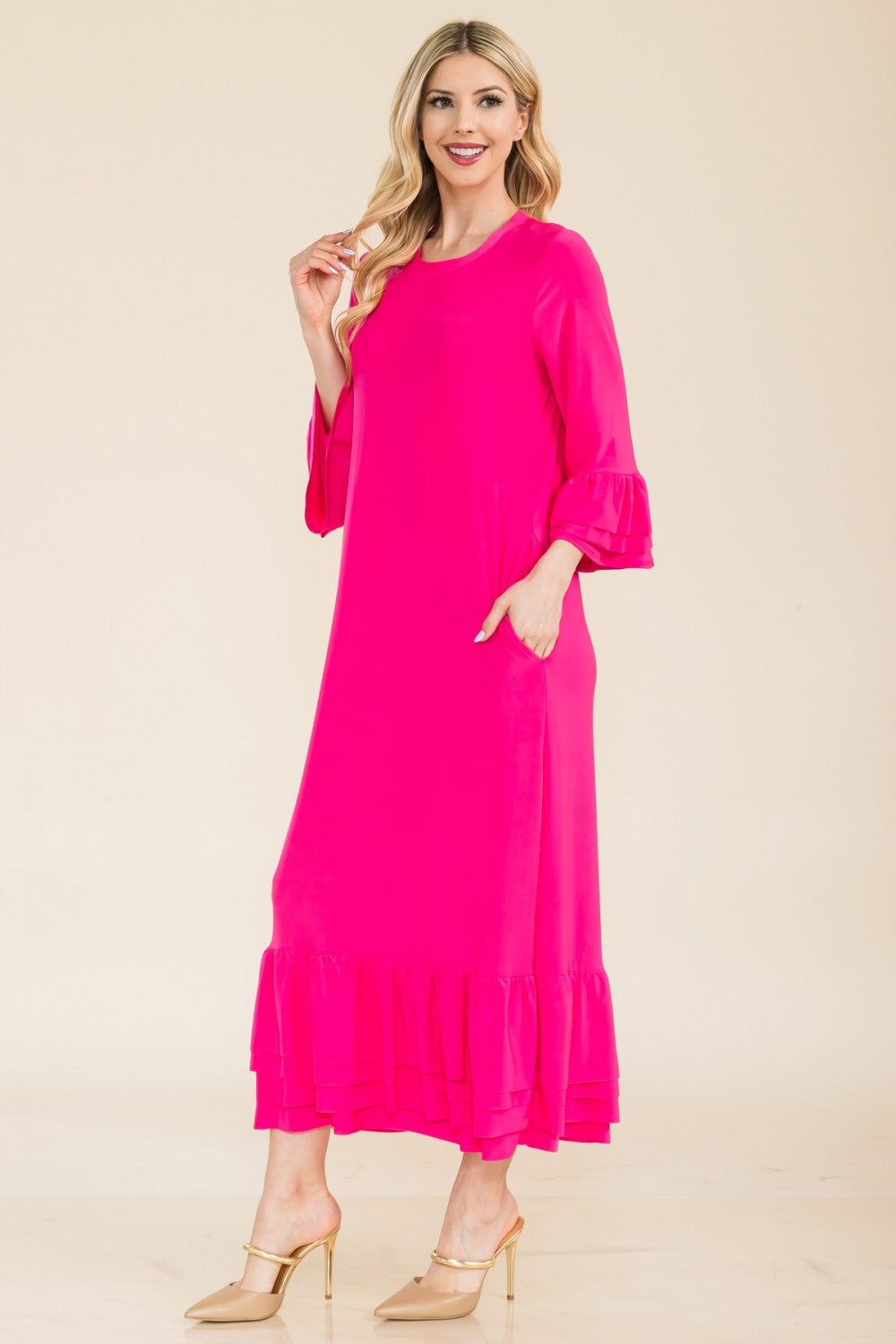 Pink modest 3/4 sleeve dress with ruffle bell sleeves from Celeste Clothing, designed for plus size with a flattering fit.