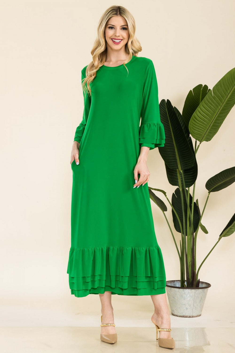 Pink modest 3/4 sleeve dress with ruffle bell sleeves from Celeste Clothing, featuring a relaxed fit and elegant design.