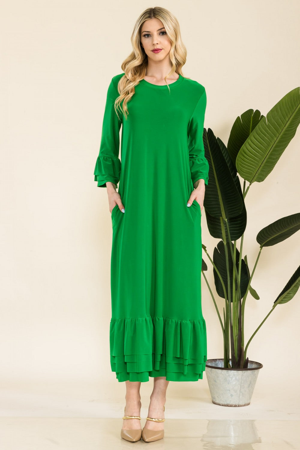 Pink modest 3/4 sleeve dress with ruffle bell sleeves from Celeste Clothing, featuring a relaxed fit and elegant design.