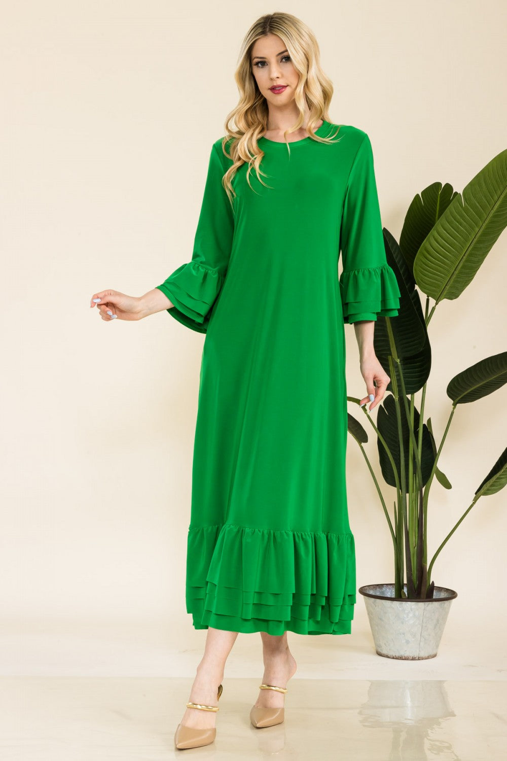 Pink modest 3/4 sleeve dress with ruffle bell sleeves from Celeste Clothing, featuring a comfortable fit for regular Missy sizes.