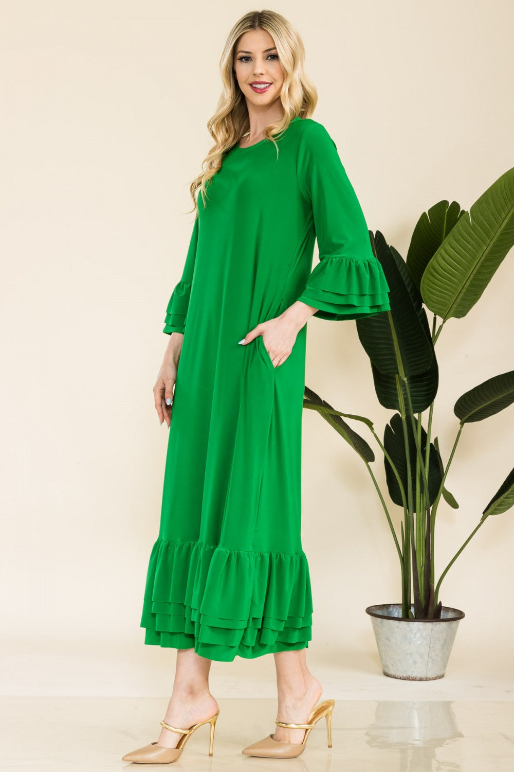 Pink modest 3/4 sleeve dress with ruffle bell sleeves from Celeste Clothing, featuring a relaxed fit and elegant design.