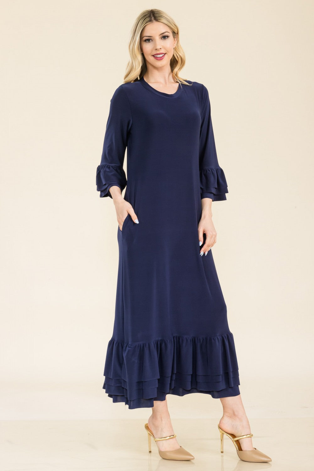 Pink modest 3/4 sleeve dress with ruffle bell sleeves from Celeste Clothing, featuring a relaxed fit for regular Missy sizing.