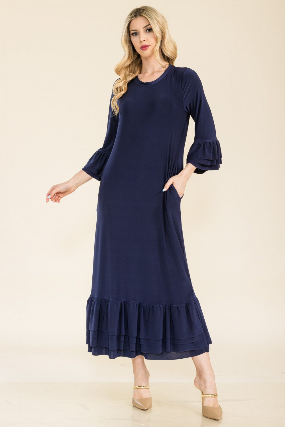 Pink modest 3/4 sleeve dress with ruffle bell sleeves from Celeste Clothing, featuring a relaxed fit for regular missy sizes.