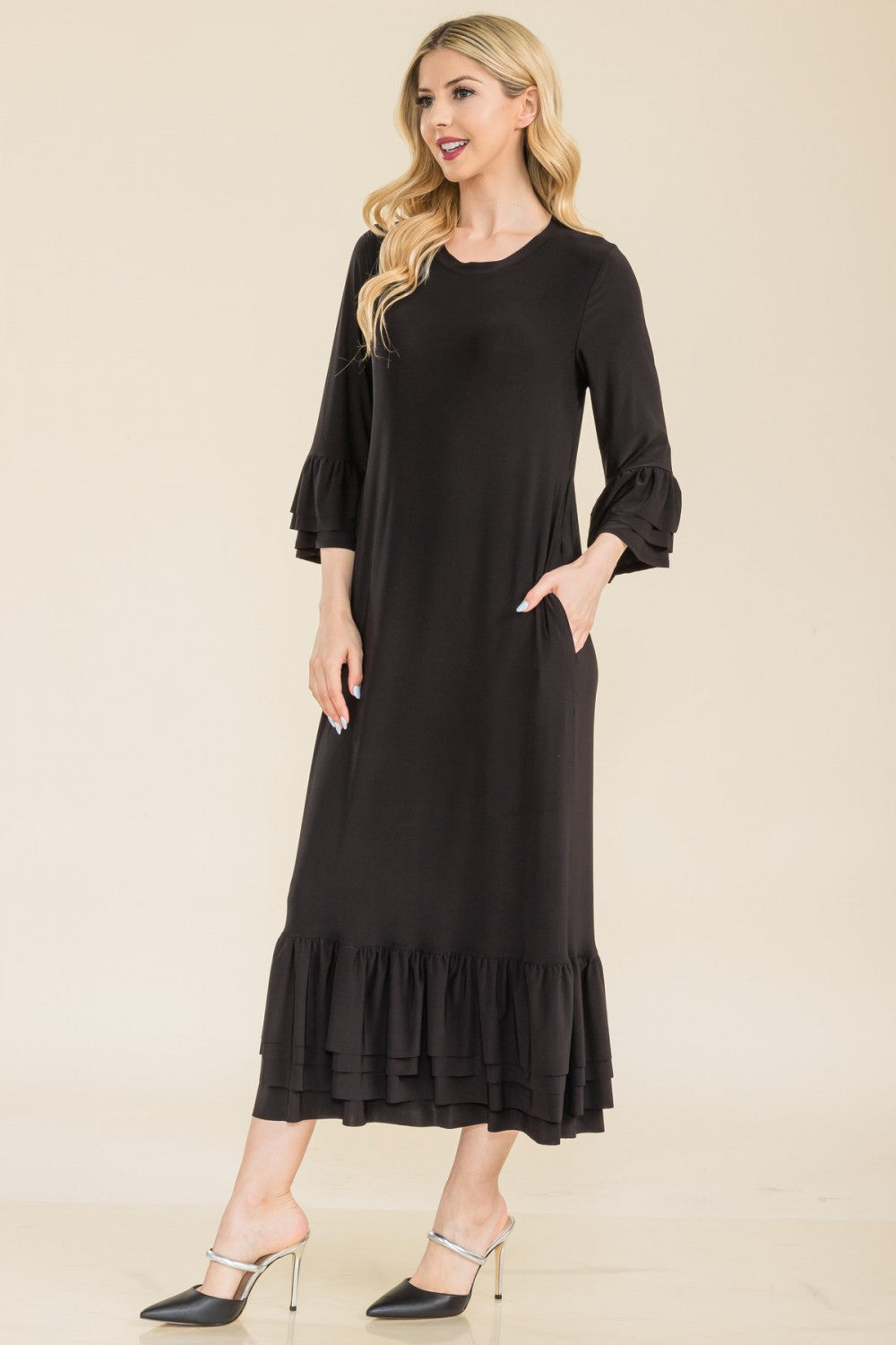 Pink modest 3/4 sleeve dress with ruffle bell sleeves from Celeste Clothing, featuring a relaxed fit and stylish design.