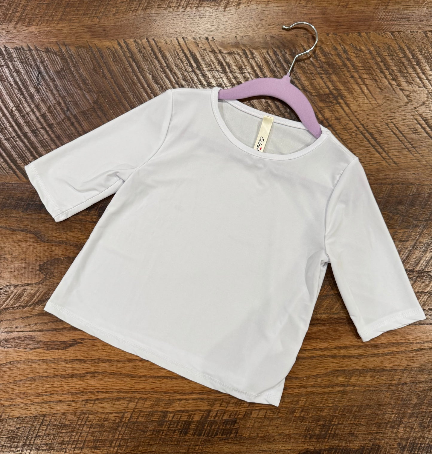 Girl's black 3/4 sleeve layering top by Celeste Clothing, soft fabric, perfect for stylish layering and casual wear.