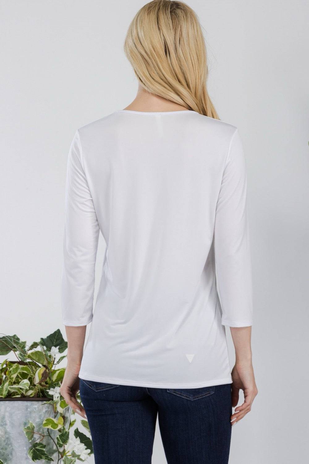 Celeste Clothing Ivory White modest layering top with 3/4 sleeves, solid color, lightweight design, perfect for casual wear.
