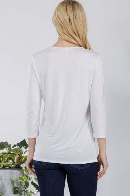 Celeste Clothing Ivory White modest layering top with 3/4 sleeves, solid color, lightweight design, perfect for casual wear.