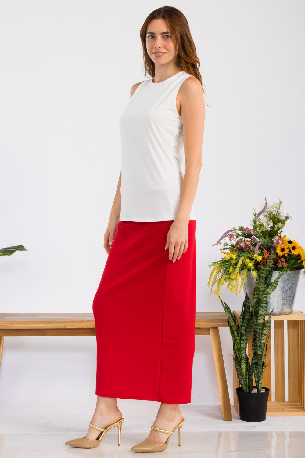 Celeste Clothing white sleeveless layering top, wrinkle-free, modest design, perfect for casual or layered outfits.