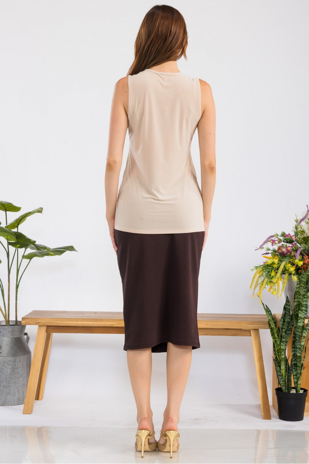 White sleeveless layering top by Celeste Clothing, wrinkle-free and modest, perfect for versatile outfits.