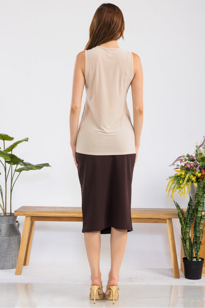 White sleeveless layering top by Celeste Clothing, wrinkle-free and modest, perfect for versatile outfits.
