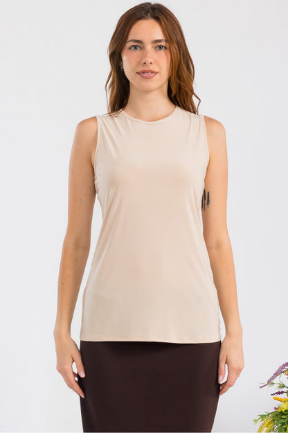 White sleeveless layering top by Celeste Clothing, wrinkle-free and modest, ideal for versatile wardrobe styling.