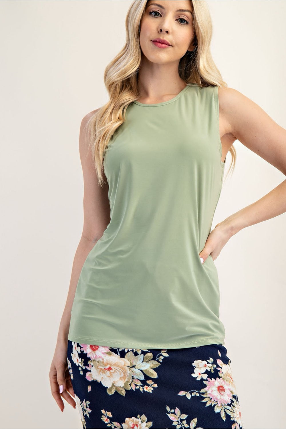 Celeste Clothing sleeveless layering top in white, wrinkle-free, modest design, perfect for versatile wardrobe styling.