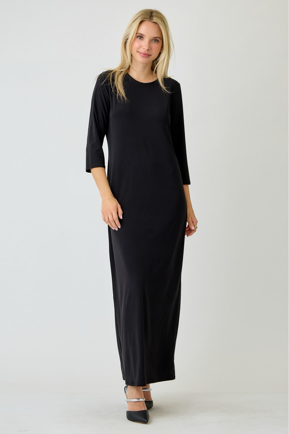 Ladies long sleeve plus layering maxi dress in classic black by Celeste Clothing, showcasing a flowing, elegant design.