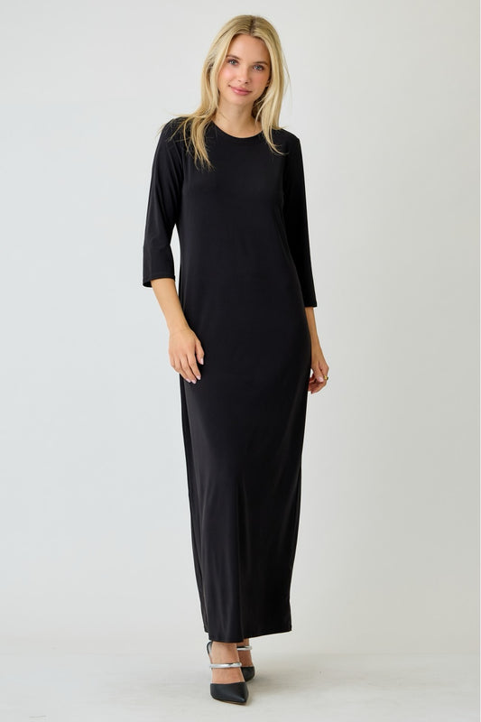 Ladies long sleeve plus layering maxi dress in classic black by Celeste Clothing, showcasing a flowing, elegant design.