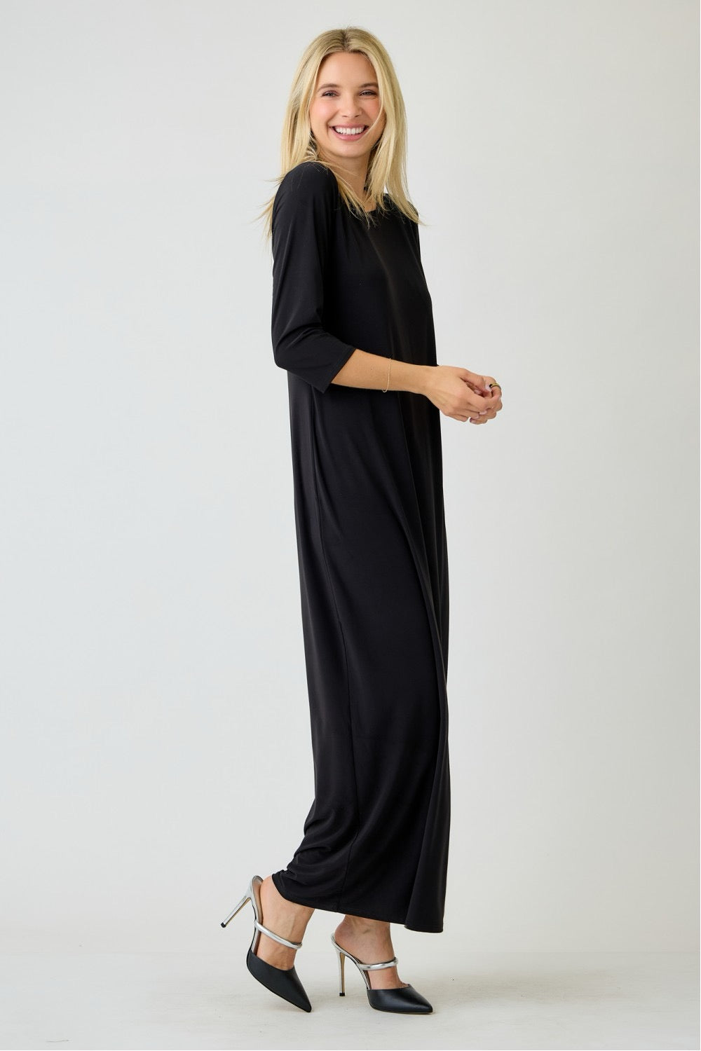 Ladies long sleeve plus layering maxi dress in classic black by Celeste Clothing, shown in a full-length view.