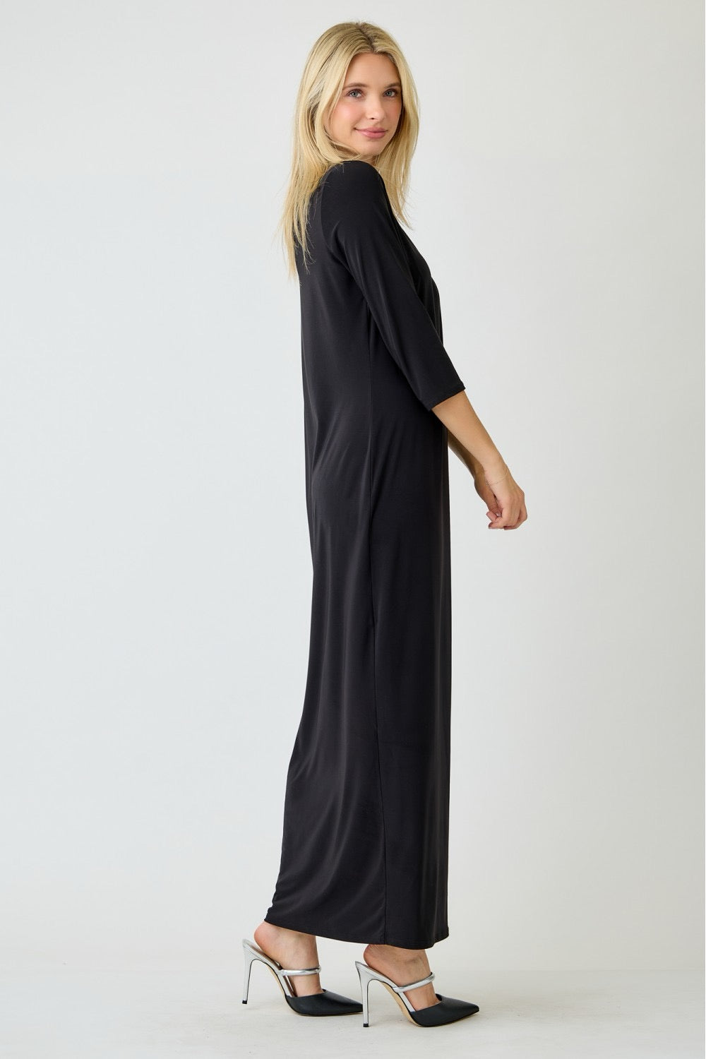 Ladies long sleeve plus layering maxi dress in classic black by Celeste Clothing, shown on a model.