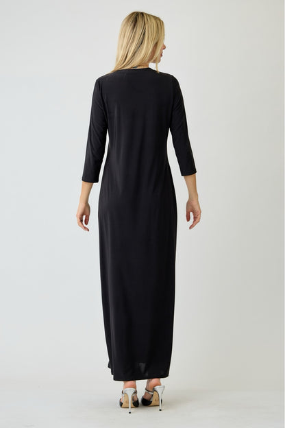 Ladies long sleeve plus layering maxi dress in classic black by Celeste Clothing, shown on a model with a flowing design.