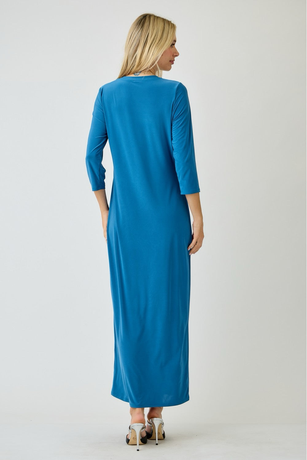 Ladies long sleeve layering maxi dress in peacock blue by Celeste Clothing, featuring a flowing silhouette and elegant design.