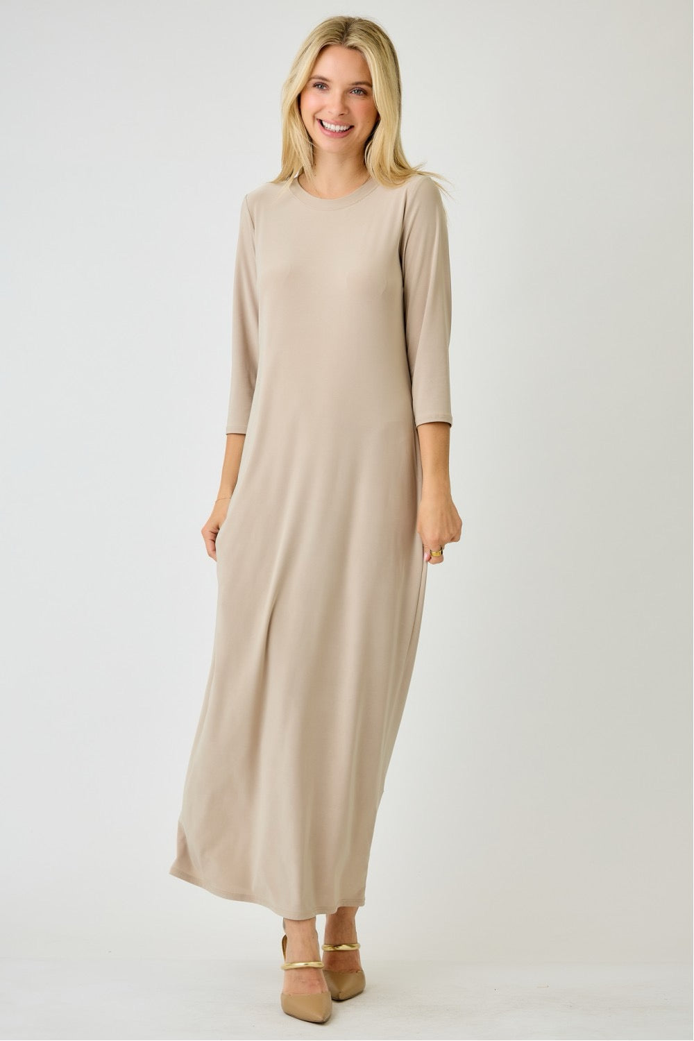 Ladies Celeste Clothing 3/4 sleeve layering maxi dress in stone, featuring a flowy silhouette and long sleeves for versatile style.