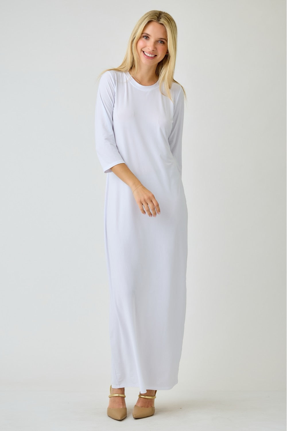 White ladies long sleeve plus layering maxi dress by Celeste Clothing, featuring a flowing, elegant design for versatile styling.