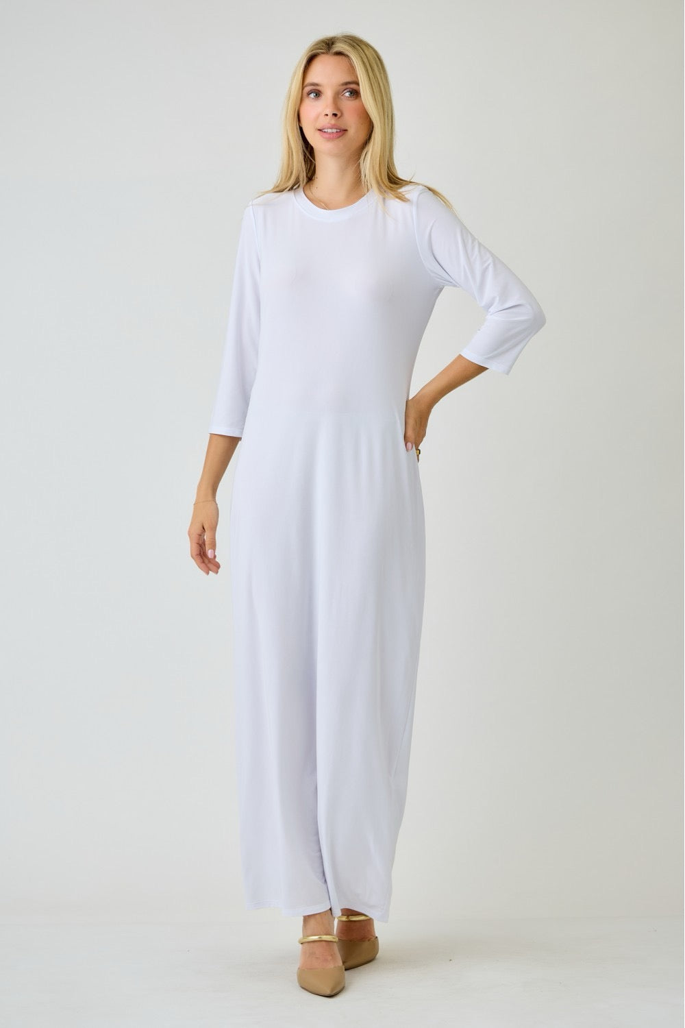 White ladies long sleeve layering maxi dress by Celeste Clothing, featuring a flowing design and comfortable fit.