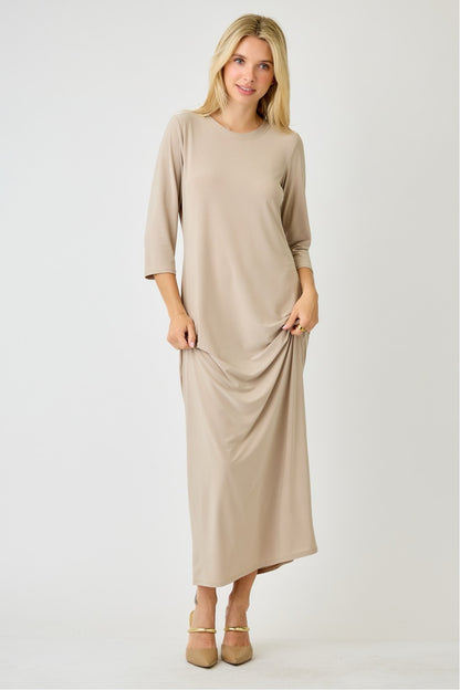 Ladies Celeste Clothing 3/4 sleeve layering maxi dress in stone, flowing fabric with a relaxed fit and elegant silhouette.
