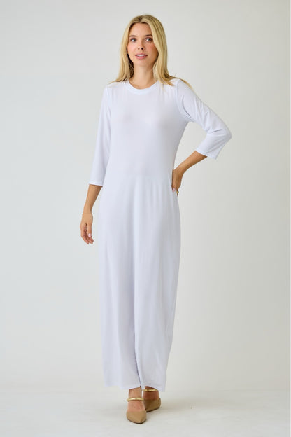 White ladies long sleeve layering maxi dress by Celeste Clothing, flowing fabric with a comfortable fit.
