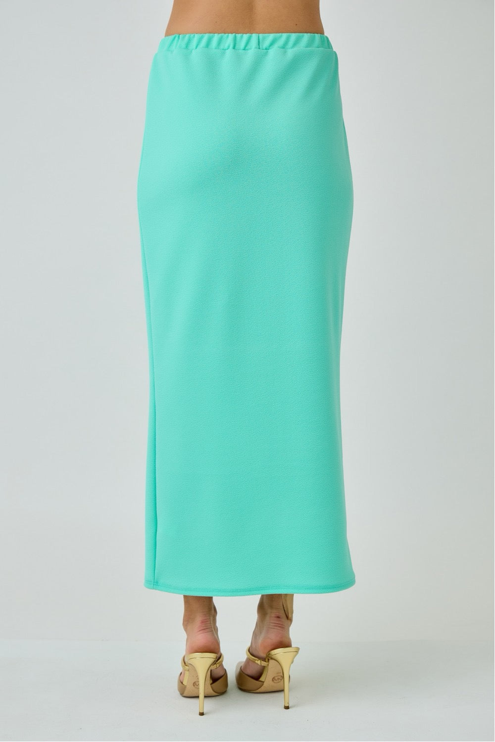 Aqua mint ladies maxi length pencil skirt by Celeste Clothing, showcasing a fitted, elegant design perfect for stylish occasions.